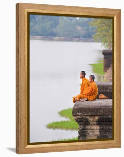 Buddhist Monks Sitting at Angkor Wat Temple, Angkor, UNESCO World Heritage Site, Cambodia-Matthew Williams-Ellis-Framed Premier Image Canvas