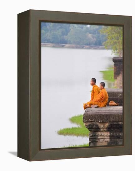 Buddhist Monks Sitting at Angkor Wat Temple, Angkor, UNESCO World Heritage Site, Cambodia-Matthew Williams-Ellis-Framed Premier Image Canvas