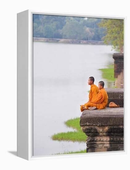 Buddhist Monks Sitting at Angkor Wat Temple, Angkor, UNESCO World Heritage Site, Cambodia-Matthew Williams-Ellis-Framed Premier Image Canvas