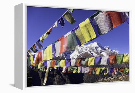 Buddhist Prayer Flags with Mount Kongde Ri Behind Taken Just Above the Town of Namche Bazaar-John Woodworth-Framed Premier Image Canvas