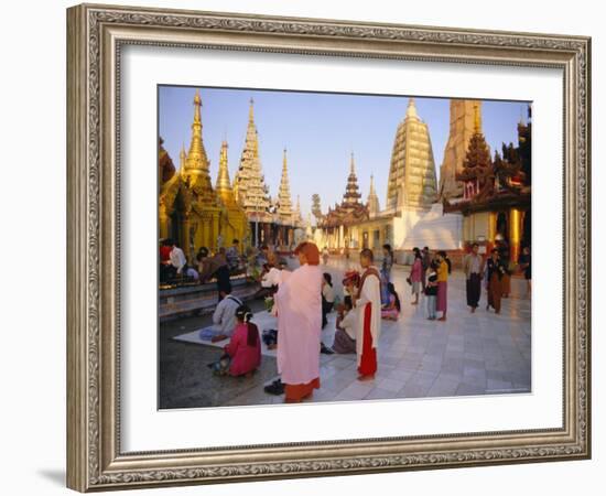 Buddhist Worshippers at the Shwedagon Paya (Shwe Dagon Pagoda), Yangon (Rangoon), Myanmar (Burma)-Christina Gascoigne-Framed Photographic Print