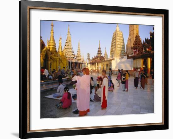 Buddhist Worshippers at the Shwedagon Paya (Shwe Dagon Pagoda), Yangon (Rangoon), Myanmar (Burma)-Christina Gascoigne-Framed Photographic Print