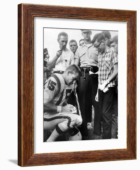 Buffalo Bills Player Jack Kemp Signs His Autograph for a Boy on August 4, 1964-null-Framed Photo