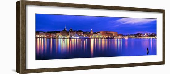 Buildings at the Waterfront Lit Up at Dusk, Stockholm, Sweden-null-Framed Photographic Print
