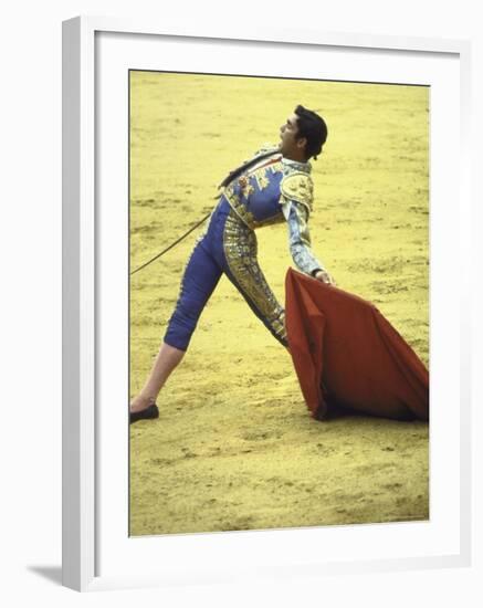 Bullfighter Francisco Ribera, Known as "Paquirri," Leaning Back in the Ring-Loomis Dean-Framed Premium Photographic Print