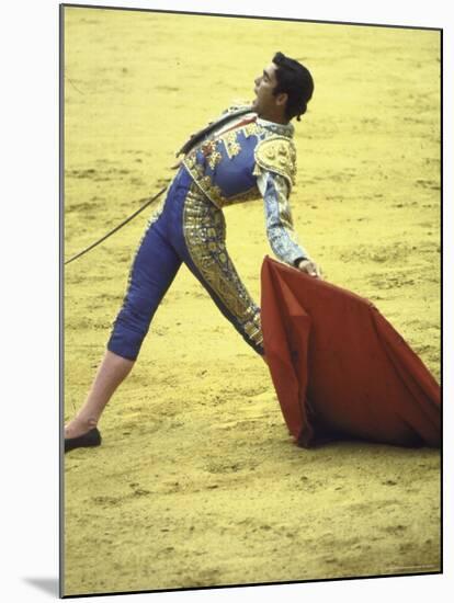 Bullfighter Francisco Ribera, Known as "Paquirri," Leaning Back in the Ring-Loomis Dean-Mounted Premium Photographic Print