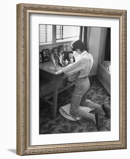 Bullfighter Rafael Rodrigues Saying a Prayer Before His Fight-Joe Scherschel-Framed Photographic Print