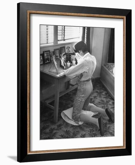 Bullfighter Rafael Rodrigues Saying a Prayer Before His Fight-Joe Scherschel-Framed Photographic Print