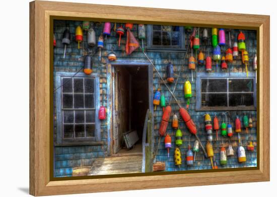 Buoys on an Old Shed at Bass Harbor, Bernard, Maine, USA-Joanne Wells-Framed Premier Image Canvas