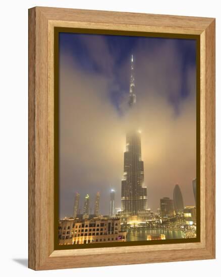 Burj Khalifa Illuminates the Clouds and Surrounding Skyline at Night, Downtown, Dubai, Uae-Amanda Hall-Framed Premier Image Canvas