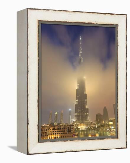 Burj Khalifa Illuminates the Clouds and Surrounding Skyline at Night, Downtown, Dubai, Uae-Amanda Hall-Framed Premier Image Canvas