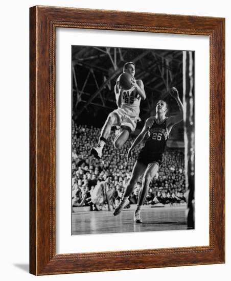 Burke Scott of Hoosiers Basketball Team Leaping Through Air Towards Lay Up Shot at Basketball Hoop-Francis Miller-Framed Photographic Print