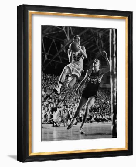 Burke Scott of Hoosiers Basketball Team Leaping Through Air Towards Lay Up Shot at Basketball Hoop-Francis Miller-Framed Photographic Print