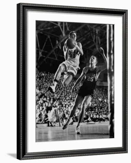 Burke Scott of Hoosiers Basketball Team Leaping Through Air Towards Lay Up Shot at Basketball Hoop-Francis Miller-Framed Photographic Print