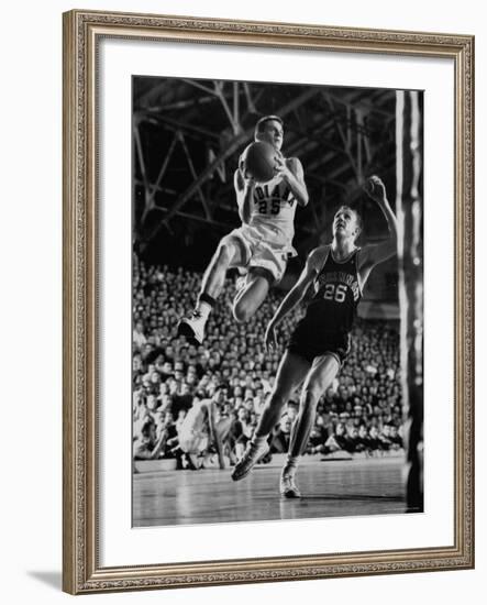 Burke Scott of Hoosiers Basketball Team Leaping Through Air Towards Lay Up Shot at Basketball Hoop-Francis Miller-Framed Photographic Print