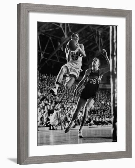 Burke Scott of Hoosiers Basketball Team Leaping Through Air Towards Lay Up Shot at Basketball Hoop-Francis Miller-Framed Photographic Print