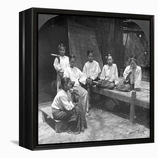 Burmese Women Smoking Outside their Home, Mandalay, Burma, 1908-null-Framed Premier Image Canvas