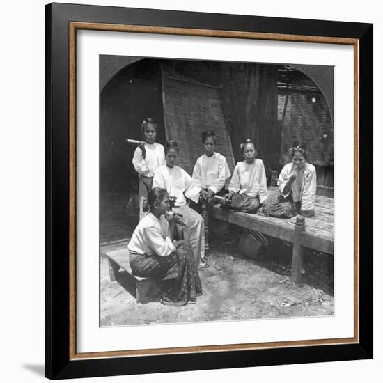 Burmese Women Smoking Outside their Home, Mandalay, Burma, 1908-null-Framed Photographic Print