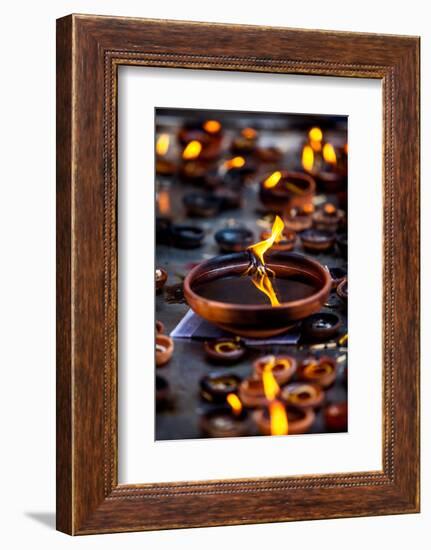 Burning Candles in the Indian Temple during Diwali, The Festival of Lights-Andrey Armyagov-Framed Photographic Print