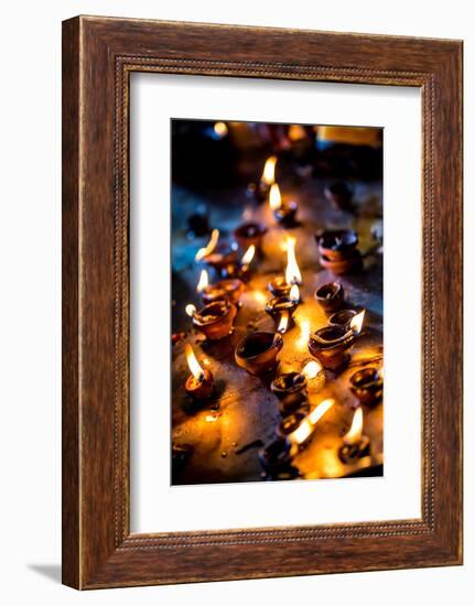 Burning Candles in the Indian Temple during Diwali, The Festival of Lights-Andrey Armyagov-Framed Photographic Print