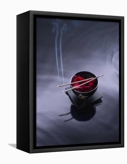 Burning incense on top of bowl of petals-John Smith-Framed Premier Image Canvas