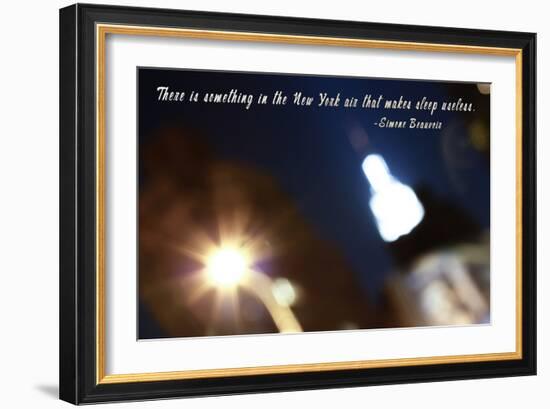 Burred Image of Empire State Building in NYC with Simon Beauvior Quote-null-Framed Photo