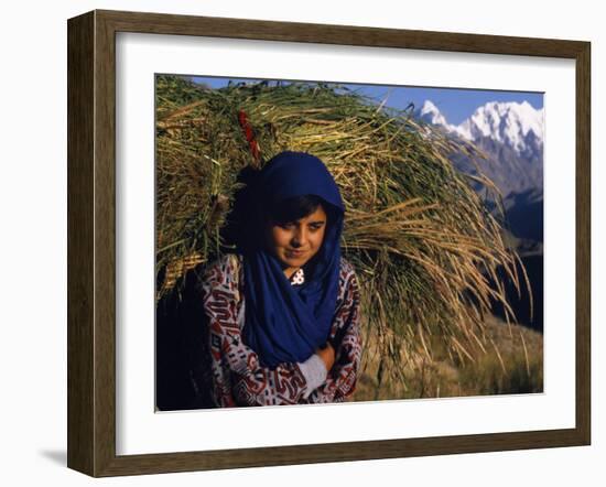 Burusho Girl Returns Home with Fodder for Her Livestock in the Hunza Valley-Amar Grover-Framed Photographic Print