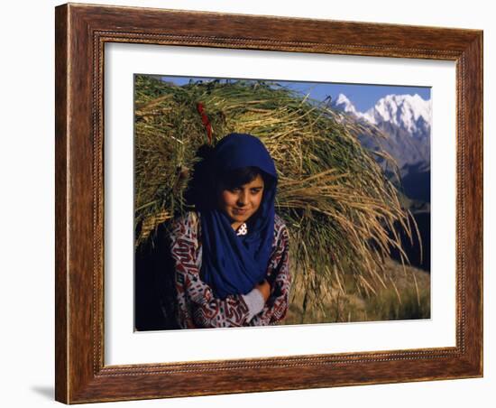 Burusho Girl Returns Home with Fodder for Her Livestock in the Hunza Valley-Amar Grover-Framed Photographic Print