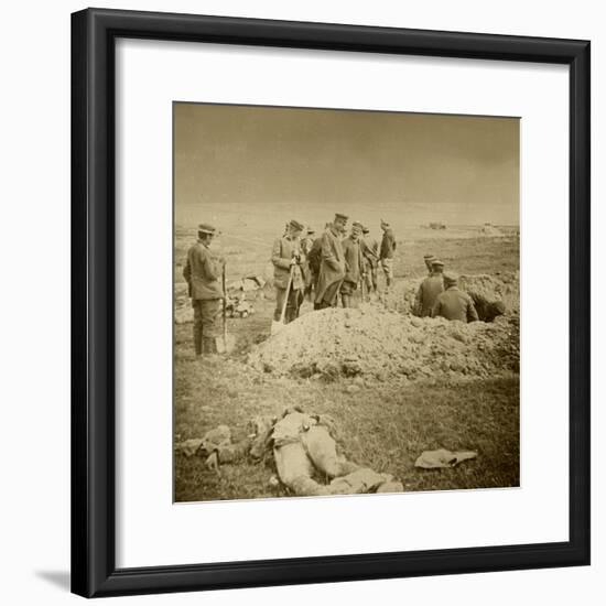 Burying bodies, Sainte-Marie-à-Py, northern France, c1914-c1918-Unknown-Framed Photographic Print