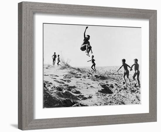 Bushman Children Playing Games on Sand Dunes-Nat Farbman-Framed Photographic Print