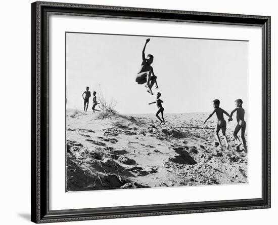 Bushman Children Playing Games on Sand Dunes-Nat Farbman-Framed Photographic Print