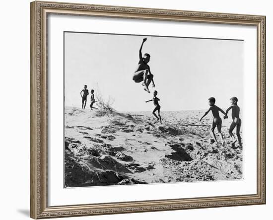 Bushman Children Playing Games on Sand Dunes-Nat Farbman-Framed Photographic Print