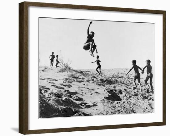 Bushman Children Playing Games on Sand Dunes-Nat Farbman-Framed Photographic Print