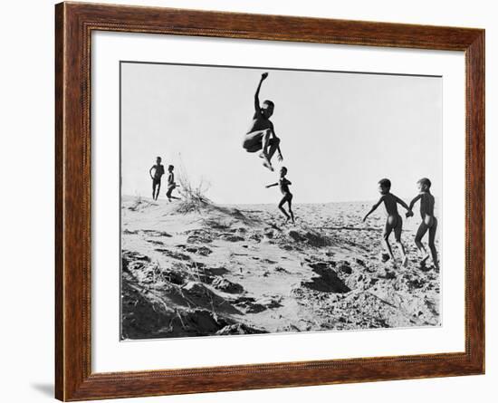Bushman Children Playing Games on Sand Dunes-Nat Farbman-Framed Photographic Print