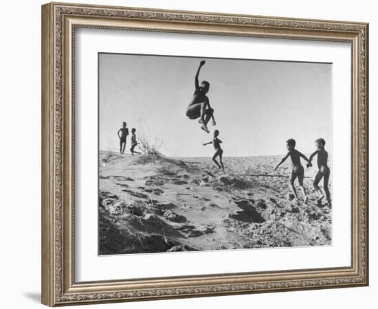 Bushman Children Playing Games on Sand Dunes-null-Framed Photographic Print