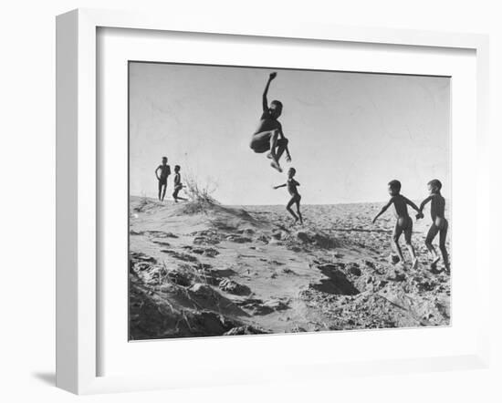 Bushman Children Playing Games on Sand Dunes-null-Framed Photographic Print