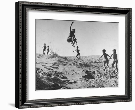 Bushman Children Playing Games on Sand Dunes-null-Framed Photographic Print