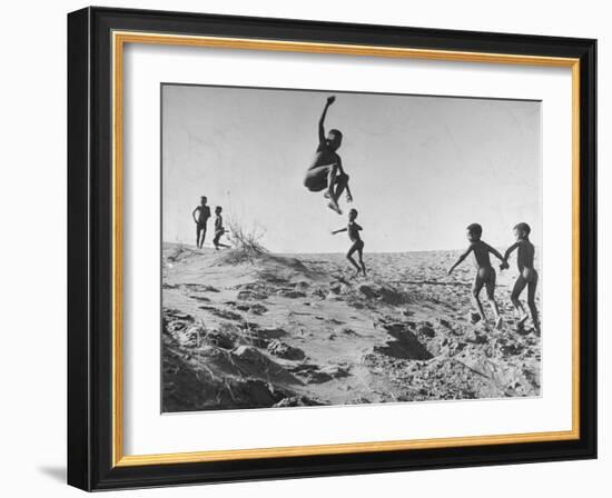 Bushman Children Playing Games on Sand Dunes-null-Framed Photographic Print