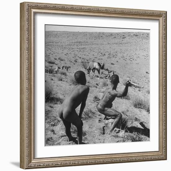 Bushman Throwing His Spear at a Winded Gemsbok-Nat Farbman-Framed Photographic Print