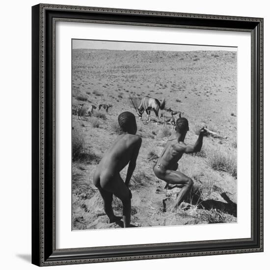 Bushman Throwing His Spear at a Winded Gemsbok-Nat Farbman-Framed Photographic Print