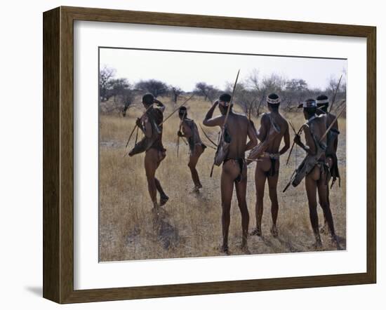 Bushmen or San Hunter-Gatherers Pause to Check a Distant Wild Animal in the Early Morning, Namibia-Nigel Pavitt-Framed Photographic Print