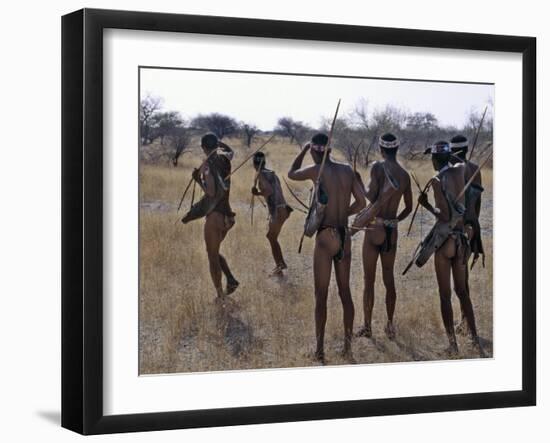 Bushmen or San Hunter-Gatherers Pause to Check a Distant Wild Animal in the Early Morning, Namibia-Nigel Pavitt-Framed Photographic Print