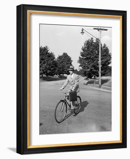 Business Man Riding Bicycle-Philip Gendreau-Framed Photographic Print