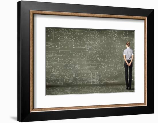 Business Person Standing Against the Blackboard with a Lot of Data-Sergey Nivens-Framed Photographic Print