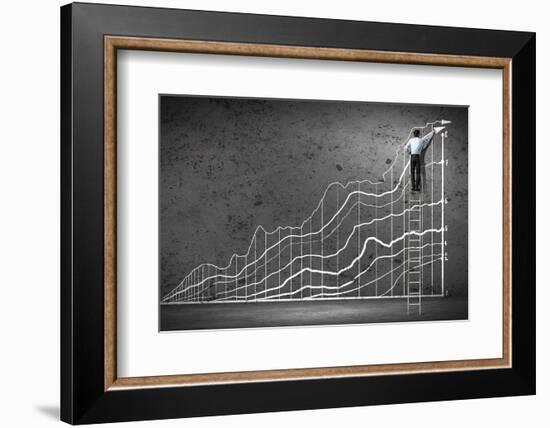 Businessman Drawing Graphics on Wall-Sergey Nivens-Framed Photographic Print