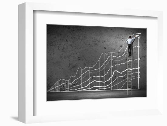 Businessman Drawing Graphics on Wall-Sergey Nivens-Framed Photographic Print