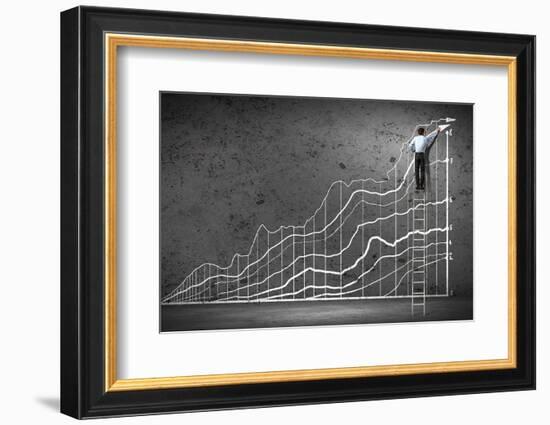 Businessman Drawing Graphics on Wall-Sergey Nivens-Framed Photographic Print