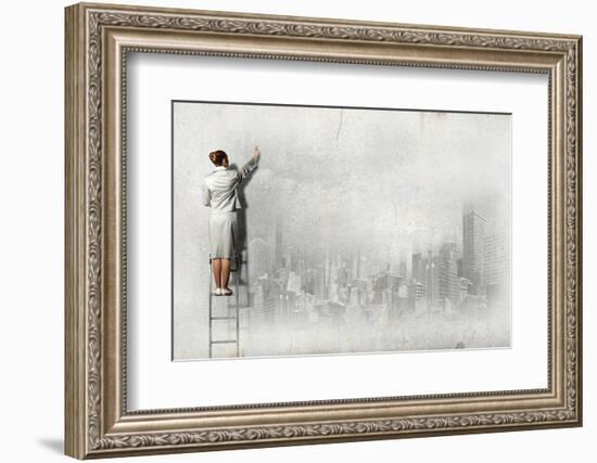 Businesswoman Standing on Ladder and Drawing Sketch on Wall-Sergey Nivens-Framed Photographic Print