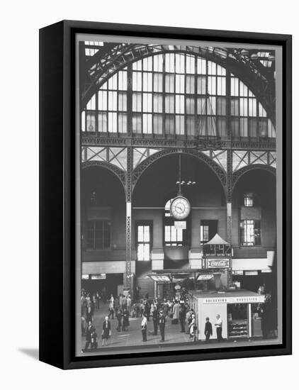 Bustling Interior Showing Digital and Standard Clocks and Ironwork Arches of Penn Station-Walker Evans-Framed Premier Image Canvas