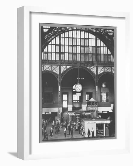 Bustling Interior Showing Digital and Standard Clocks and Ironwork Arches of Penn Station-Walker Evans-Framed Photographic Print